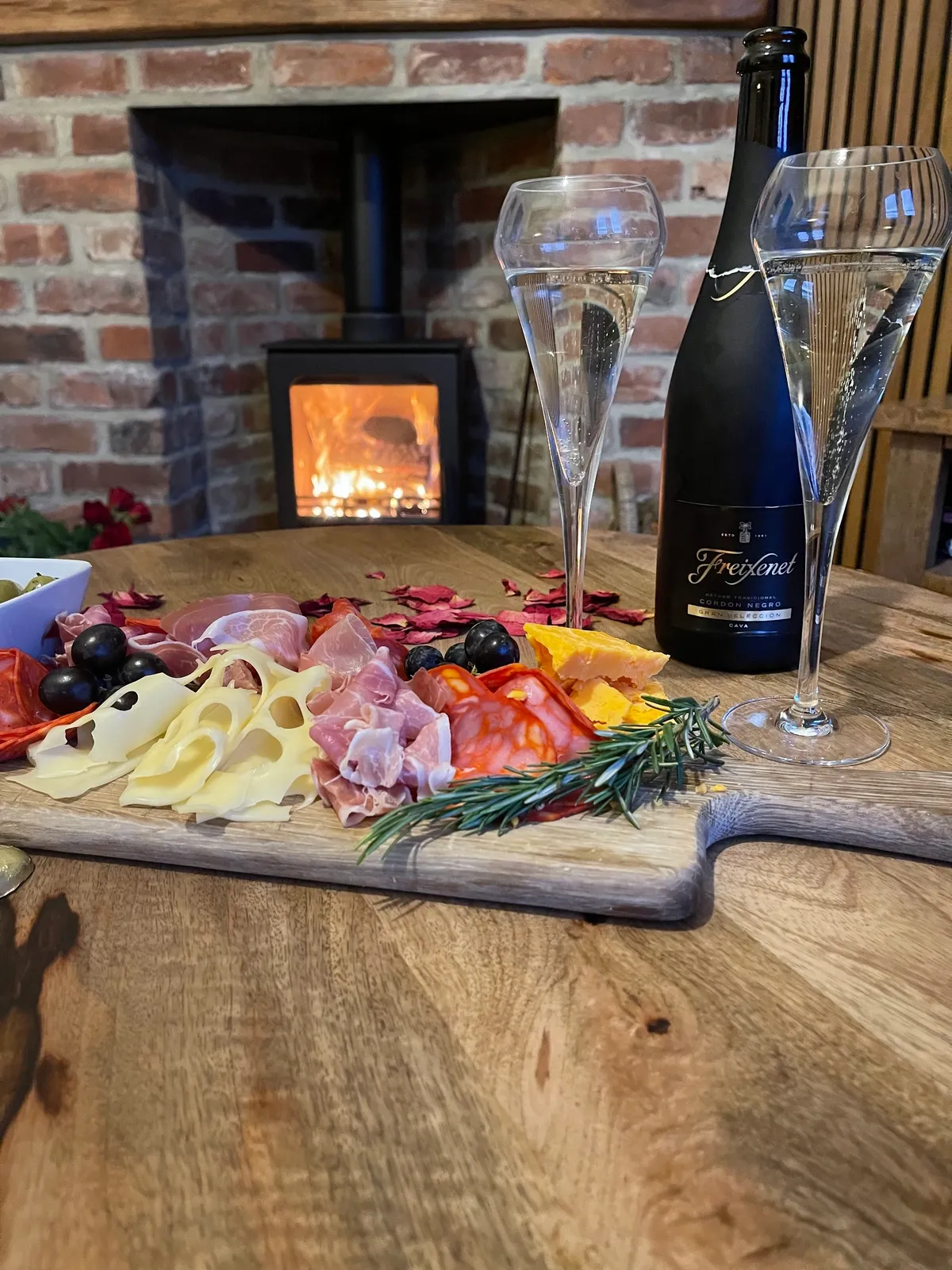 Log burner and cosy interior at The Blue Cottage